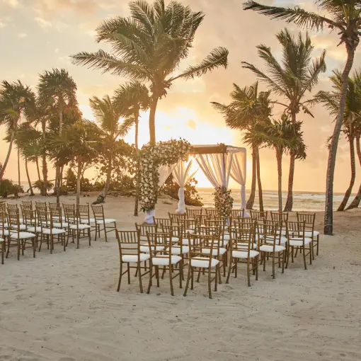 Beachfront wedding ceremony setup at Bahia Principe Grand Tulum, Tulum