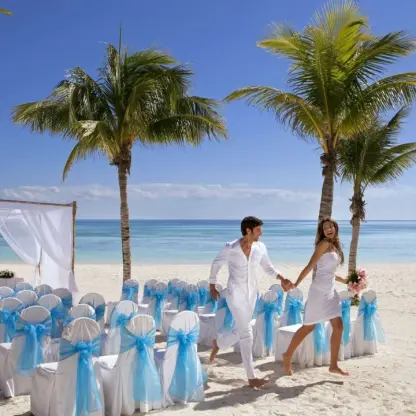 Couple running through a beach ceremony setup at Barcelo Maya Riviera, Riviera Maya