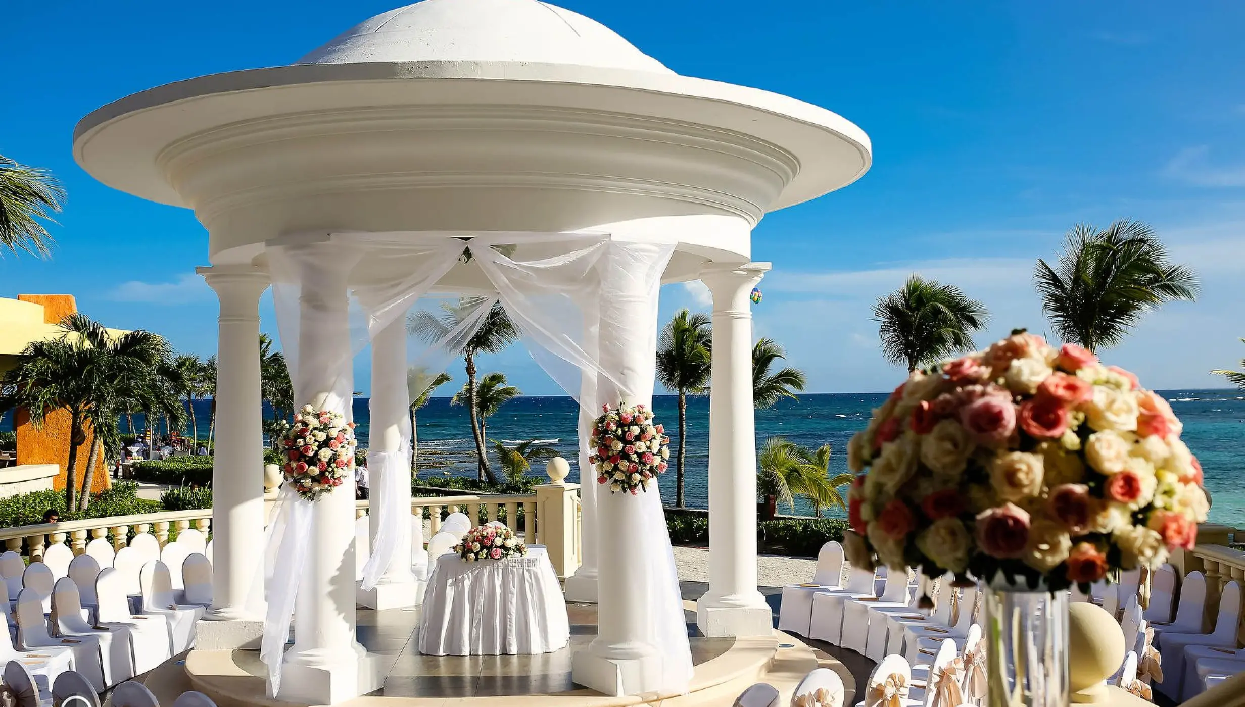 Ceremony decor in gazebo venue at Barcelo Maya beach resort