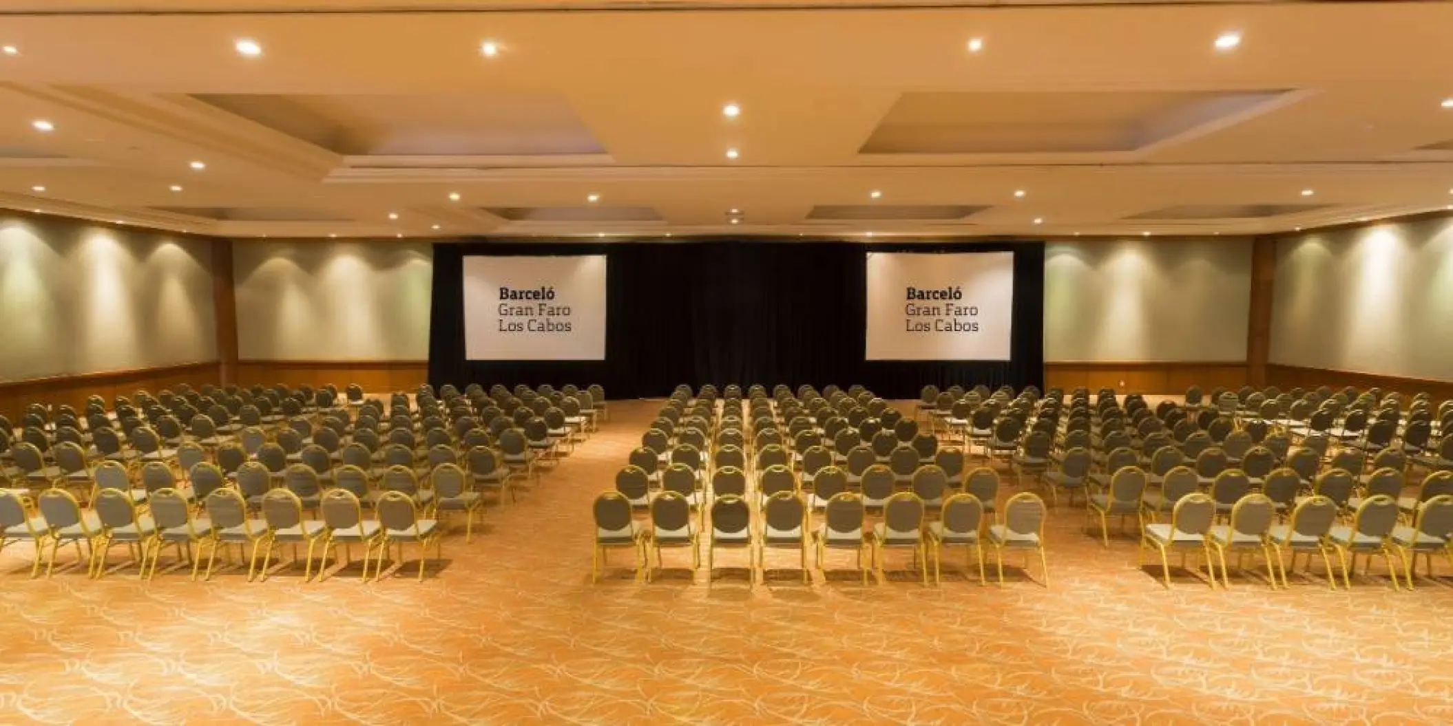 Indoor ballroom wedding reception setup at Barcelo Gran Faro, Cabo San Lucas