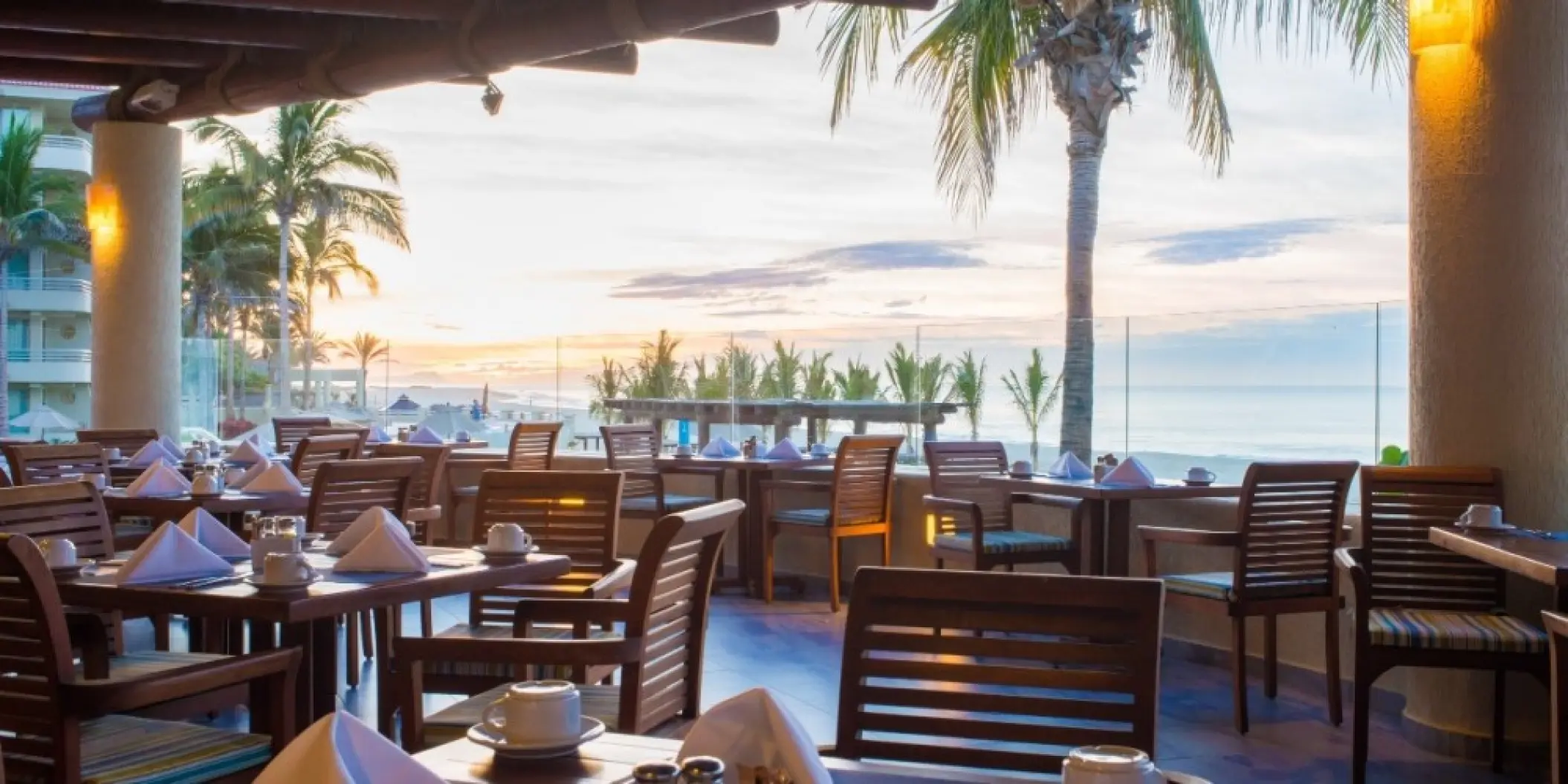 Barcelo Gran Faro Los Cabos open-air restaurant overlooking the ocean at sunset, Cabo San Lucas
