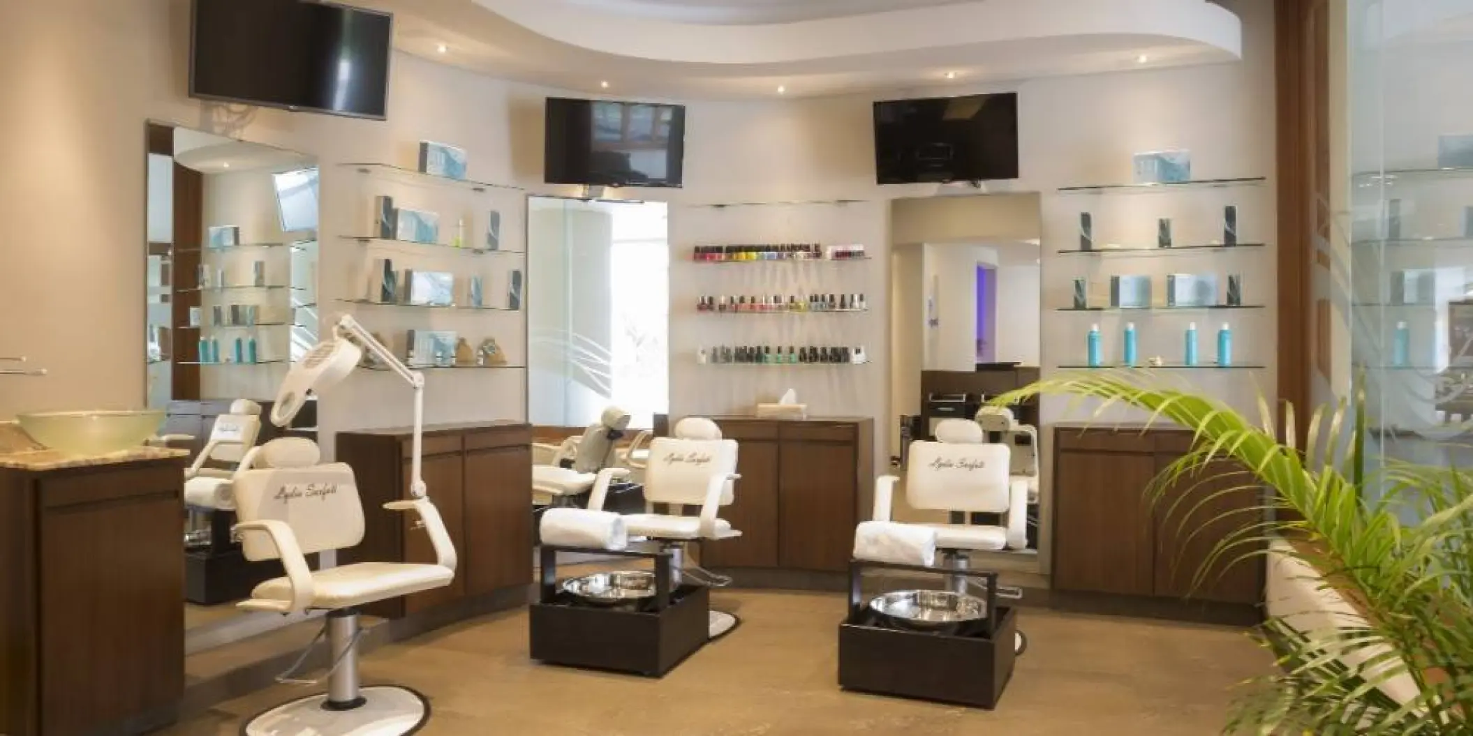 Beauty salon and spa with white styling chairs at Barcelo Gran Faro Los Cabos, Cabo San Lucas