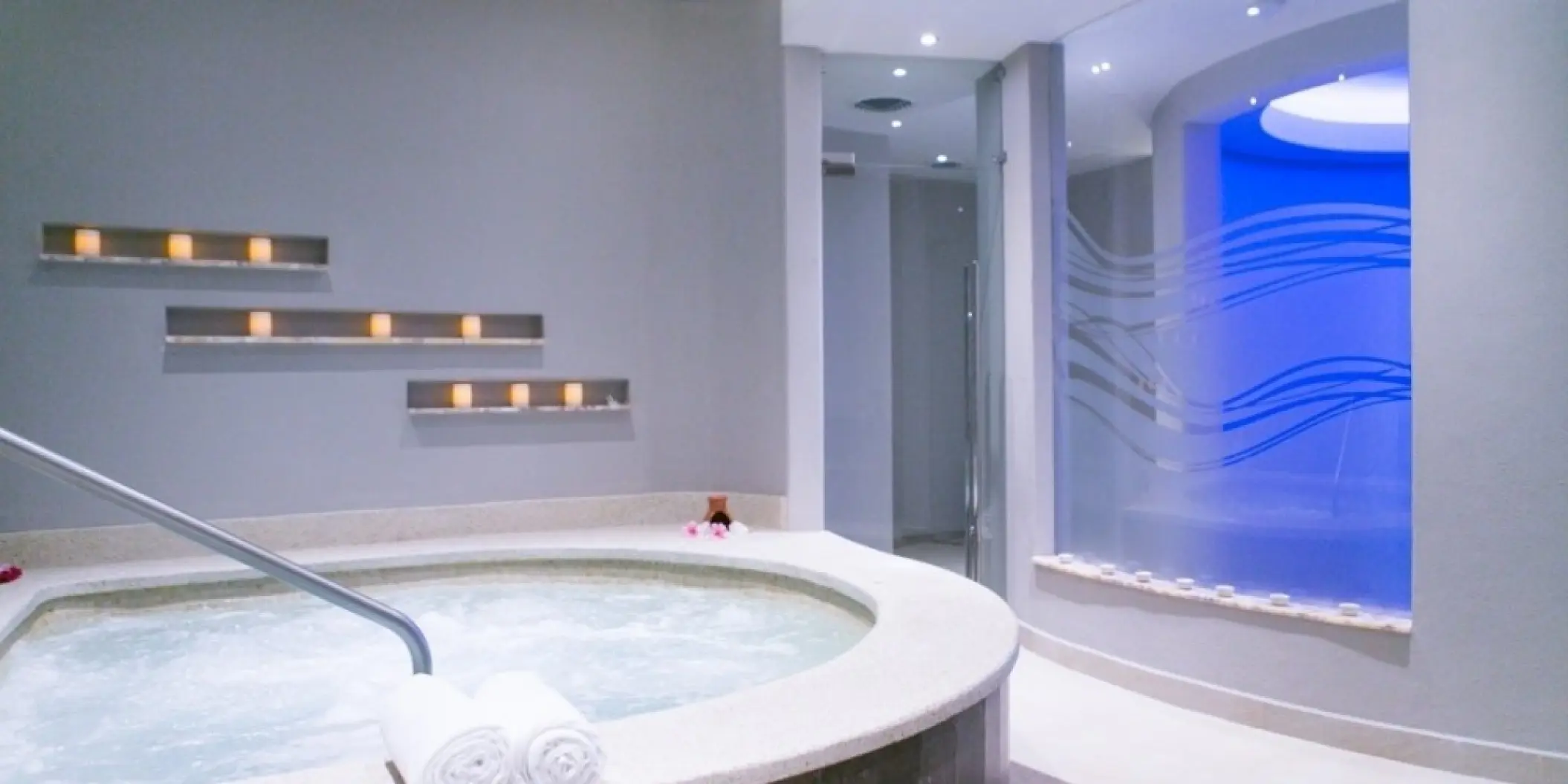 Indoor spa whirlpool with mood lighting and candles at Barcelo Gran Faro Los Cabos, Cabo San Lucas