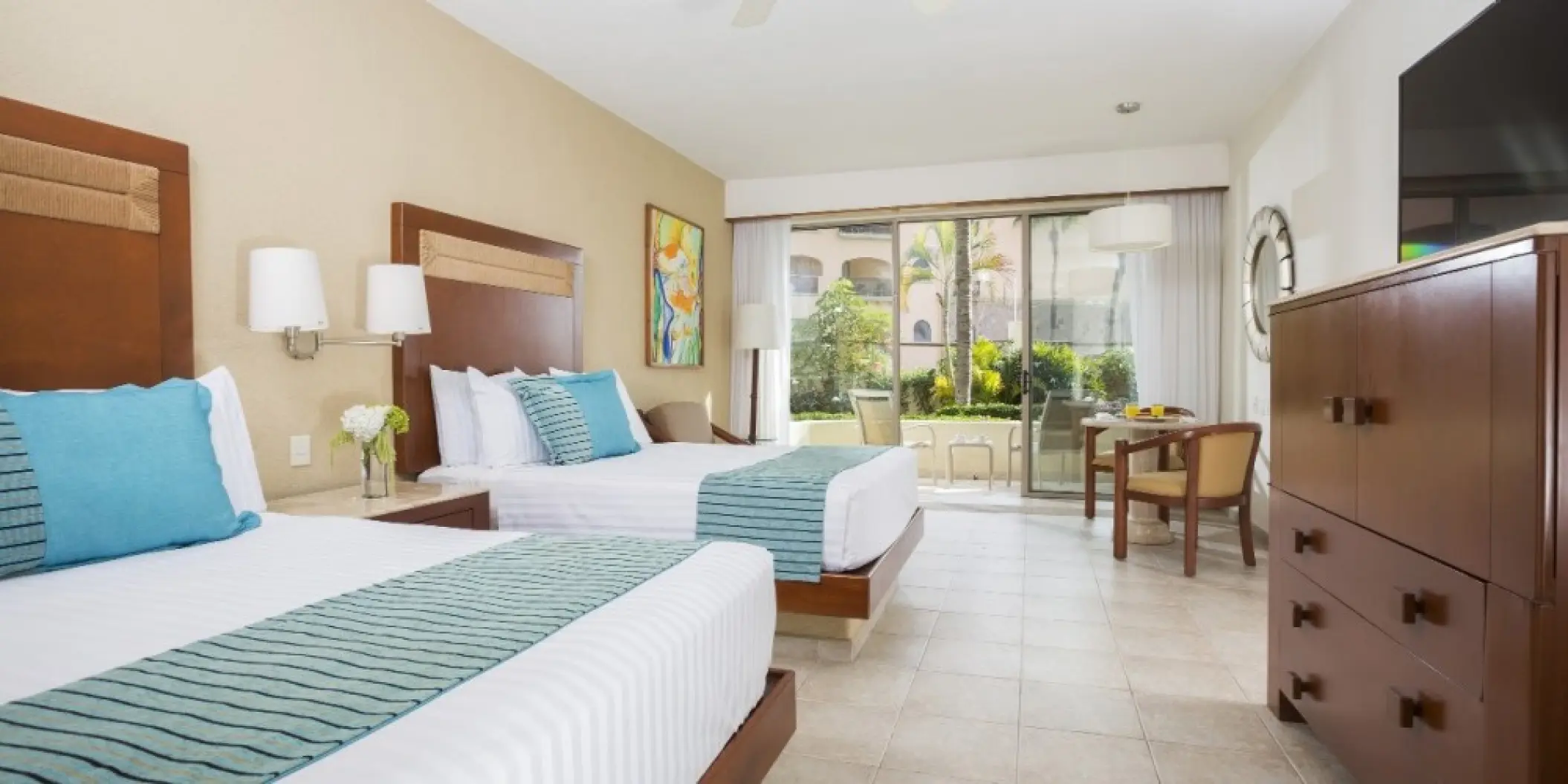 Barcelo Gran Faro Los Cabos suite with two double beds and a private terrace, Cabo San Lucas