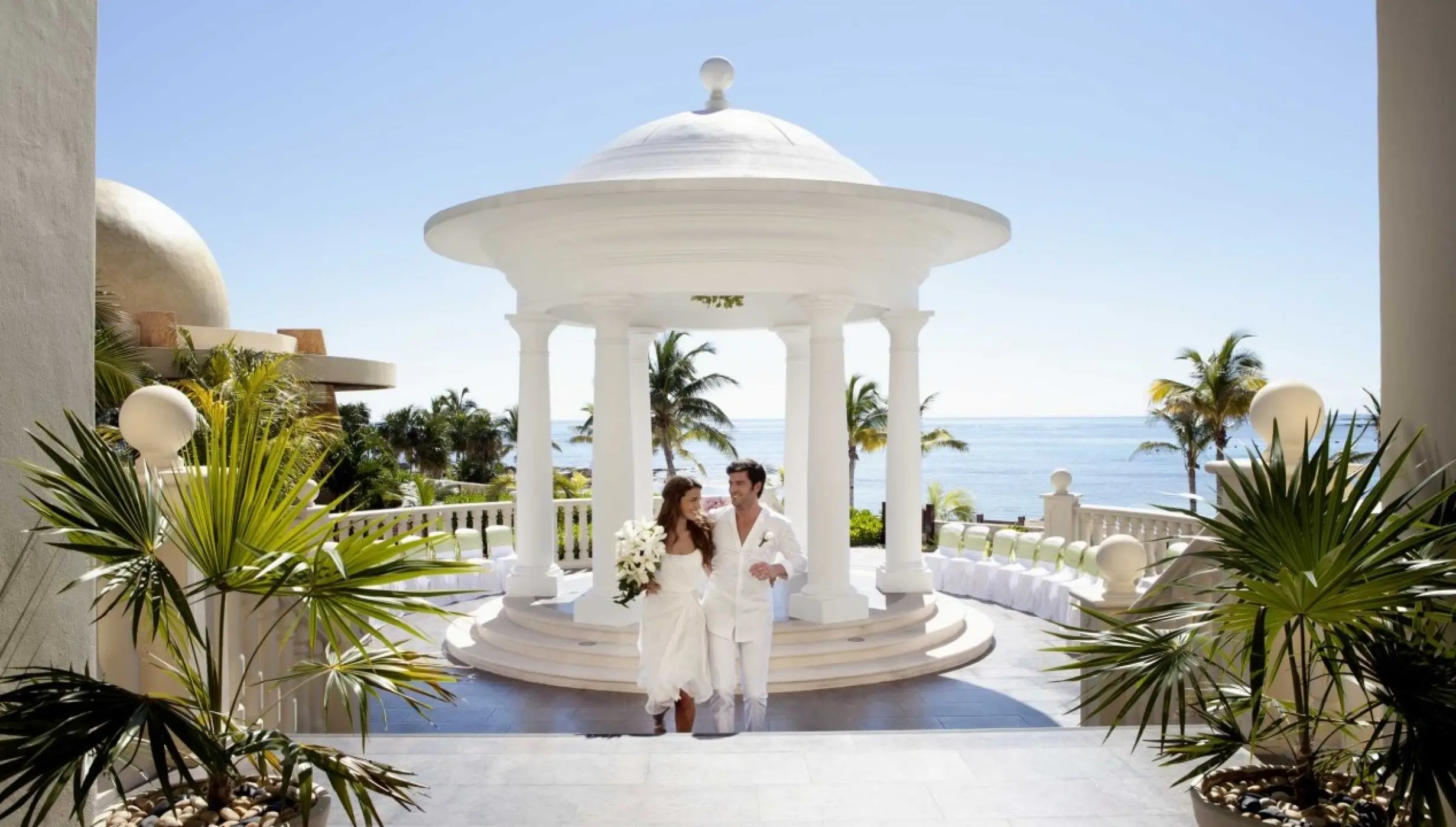 Couple in gazebo venue at Barcelo Maya beach resort