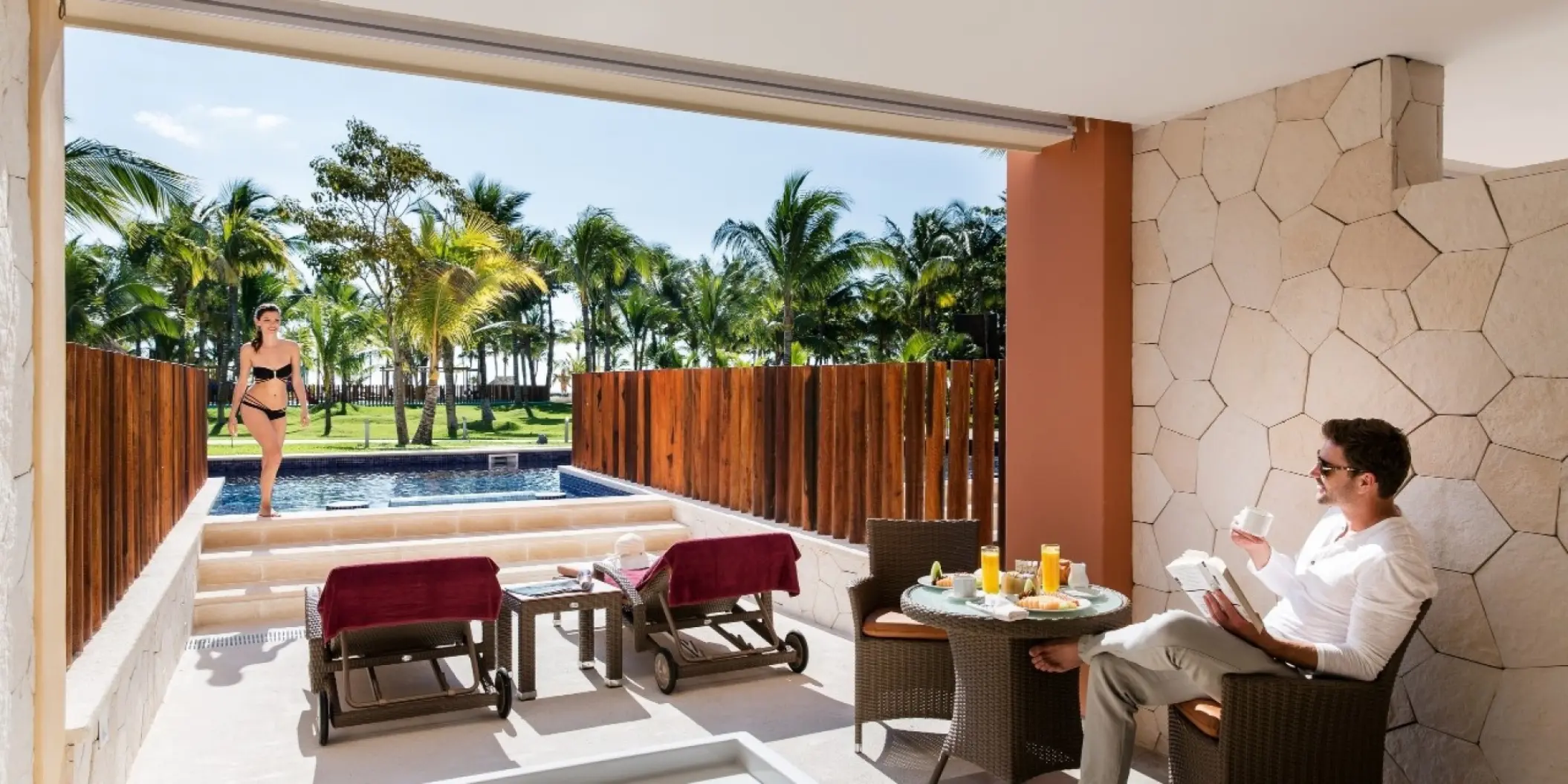 Swim-up room terrace with a private pool and patio furniture at Barcelo Maya Caribe, Riviera Maya