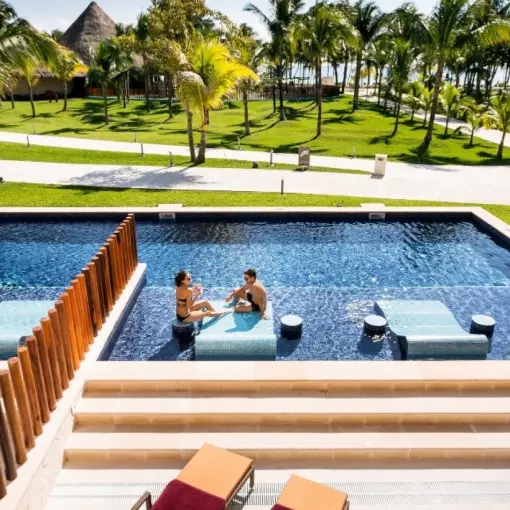 Swim-up suites with private terrace loungers at Barcelo Maya Caribe, Riviera Maya