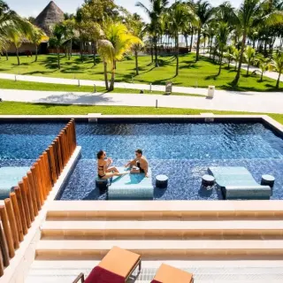 Swim-up suites with private terrace loungers at Barcelo Maya Caribe, Riviera Maya