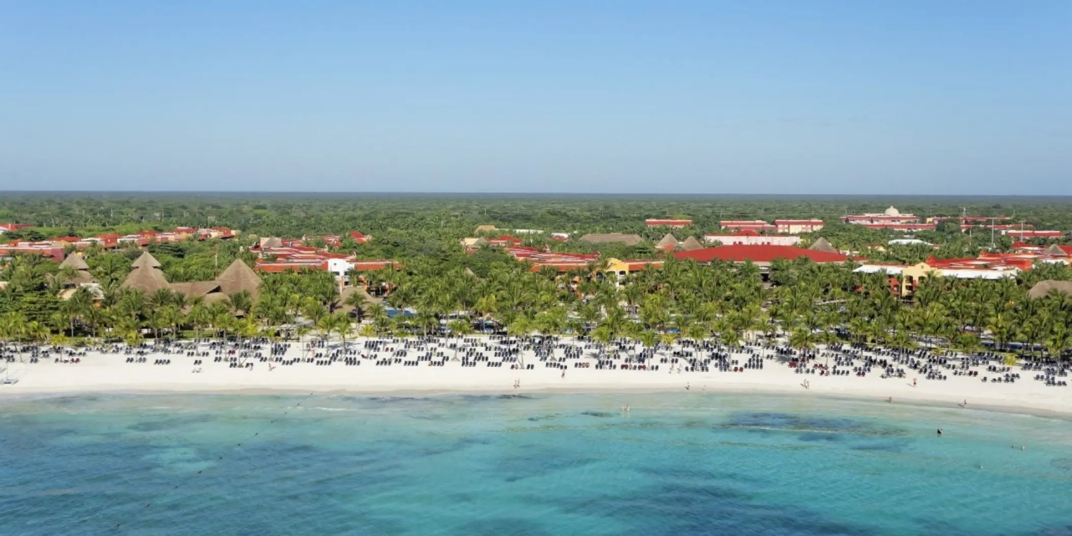 Aerial view of the white-sand beach and resort grounds at Barcelo Maya Colonial, Riviera Maya