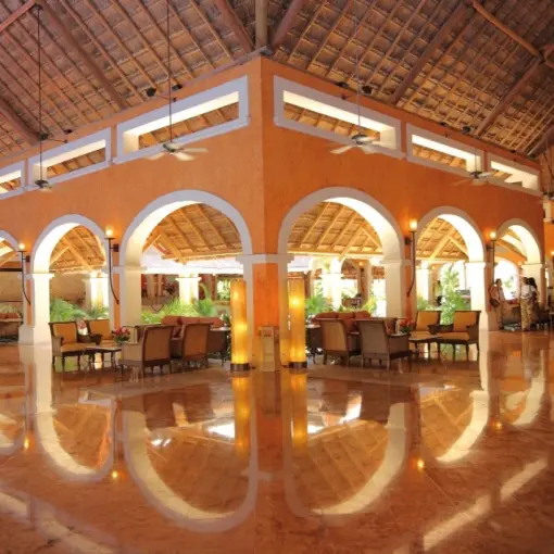Barcelo Maya Colonial open-air lobby with vaulted ceilings and polished floors, Riviera Maya