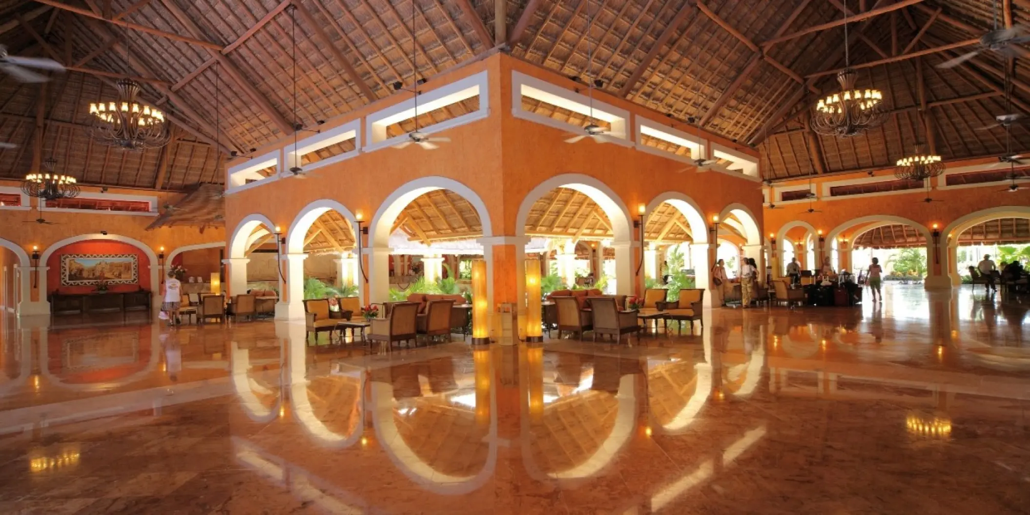 Barcelo Maya Colonial open-air lobby with vaulted ceilings and polished floors, Riviera Maya