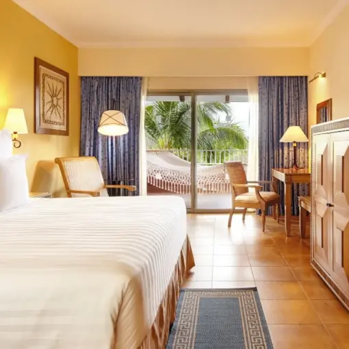 Barcelo Maya Colonial guest room with a terrace overlooking tropical gardens, Riviera Maya