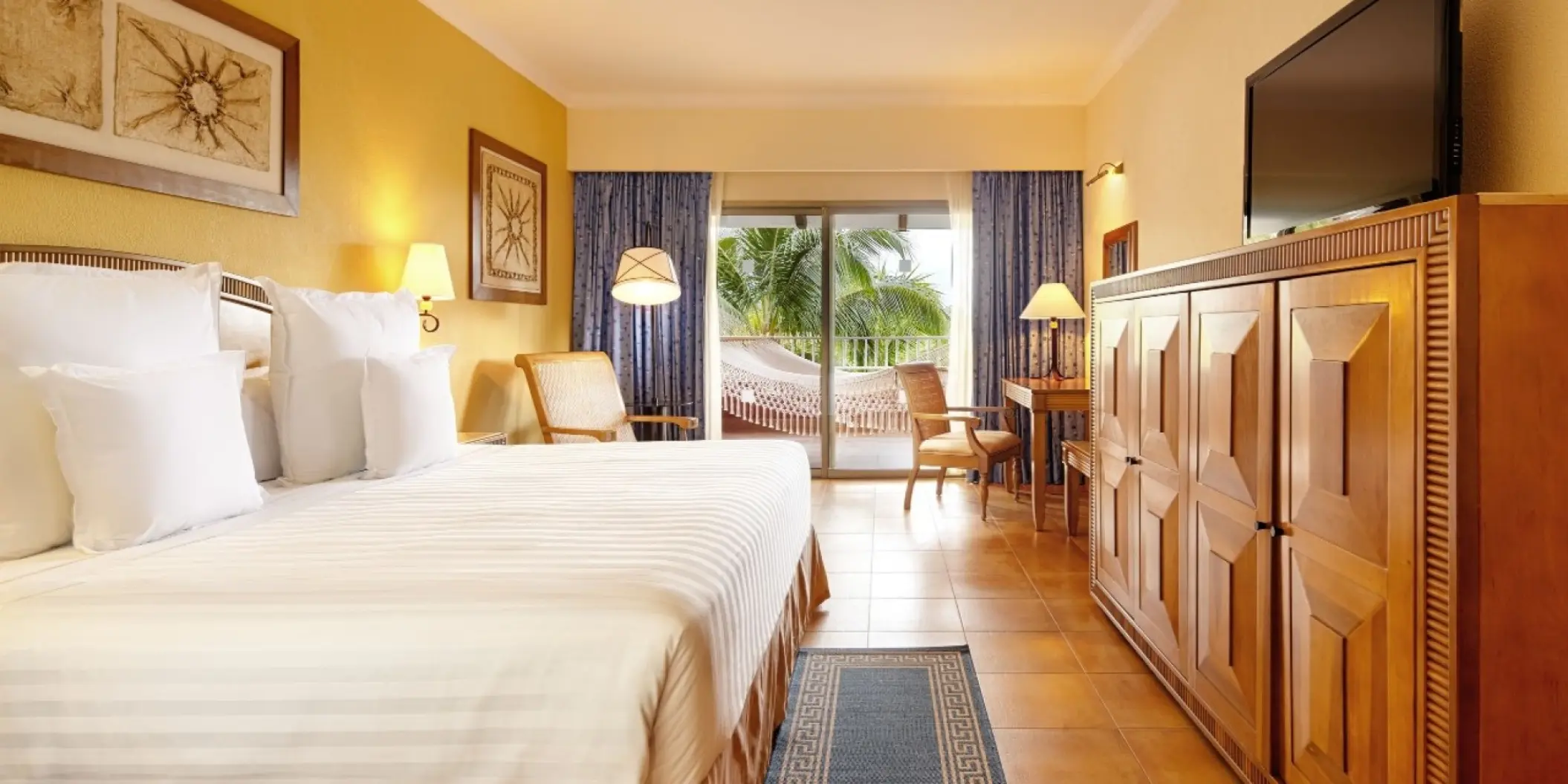 Barcelo Maya Colonial guest room with a terrace overlooking tropical gardens, Riviera Maya