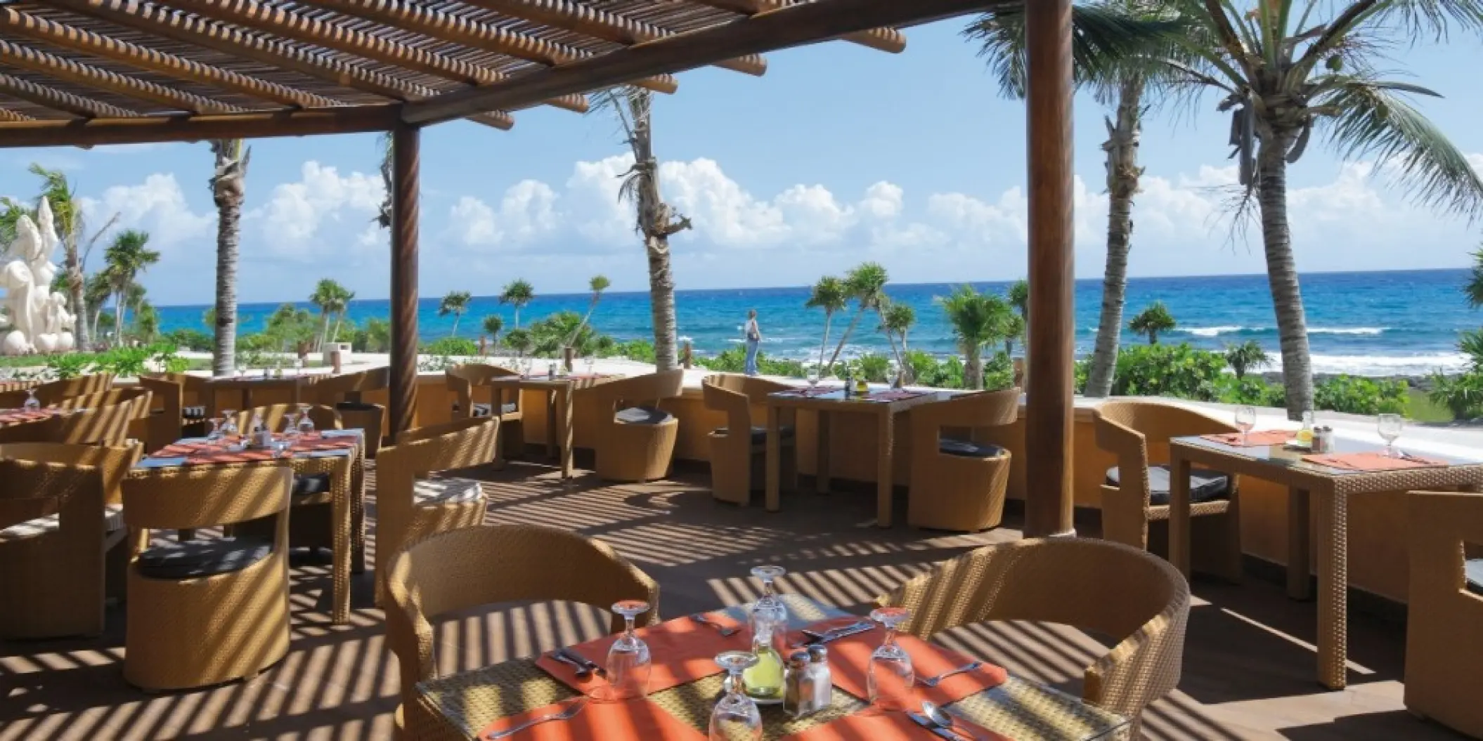 Barcelo Maya Palace outdoor restaurant terrace overlooking the ocean, Riviera Maya