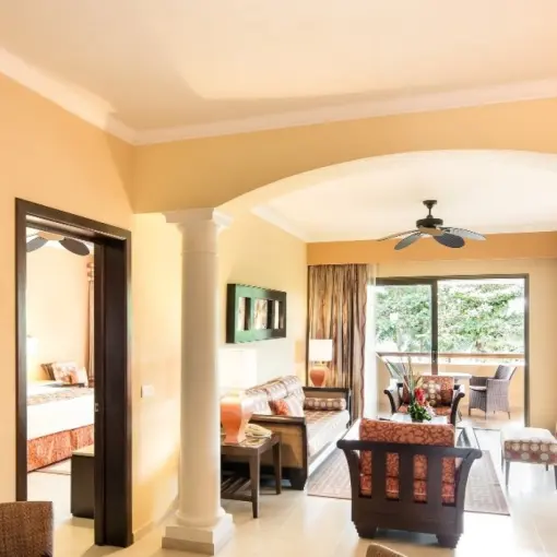 Barcelo Maya Palace suite living area with balcony, Riviera Maya