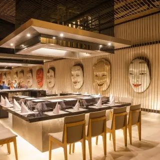 Asian restaurant with teppanyaki grills and traditional mask decor at Barcelo Maya Riviera, Riviera Maya