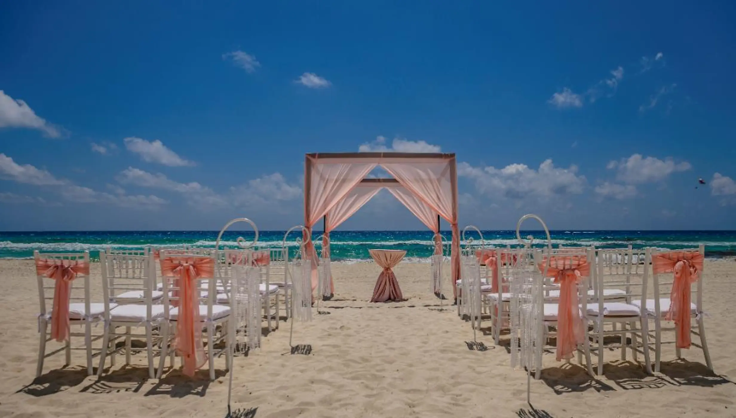 Ceremony decor on the beach wedding venue at Paradisus Cancun