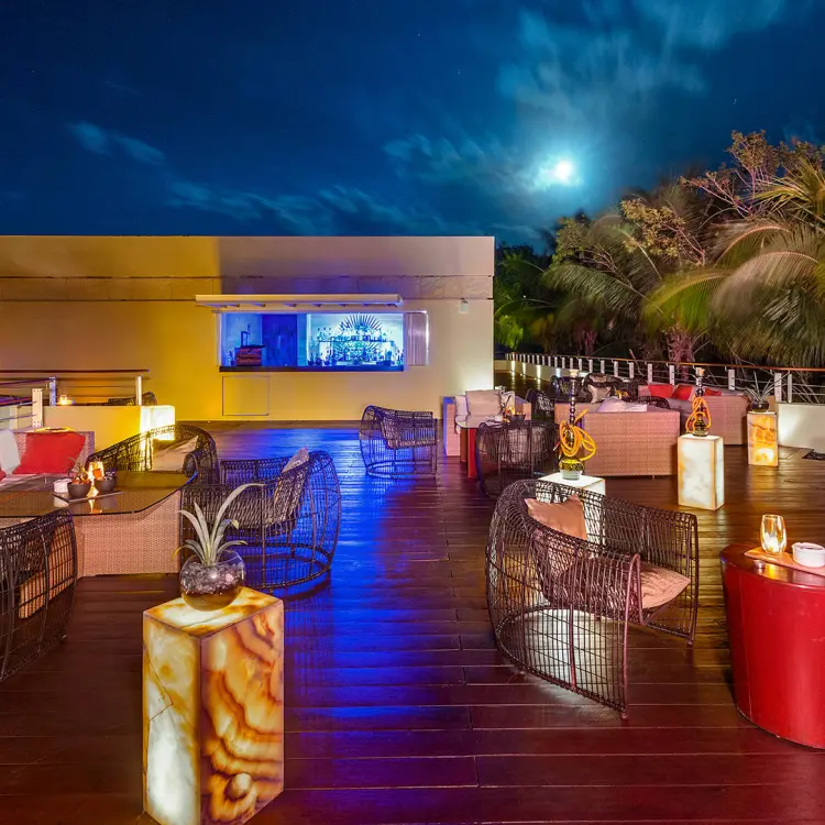 Rooftop lounge and bar at night at Blue Diamond Luxury Boutique Hotel, Playa Del Carmen