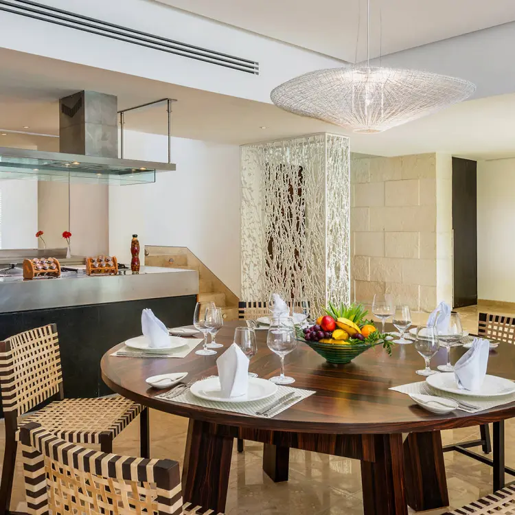 Modern dining table and buffet area at Blue Diamond Luxury Boutique Hotel, Playa Del Carmen