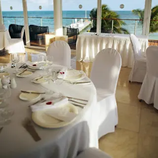 Indoor wedding reception setup with ocean views at Blue Diamond Luxury Boutique Hotel, Playa Del Carmen