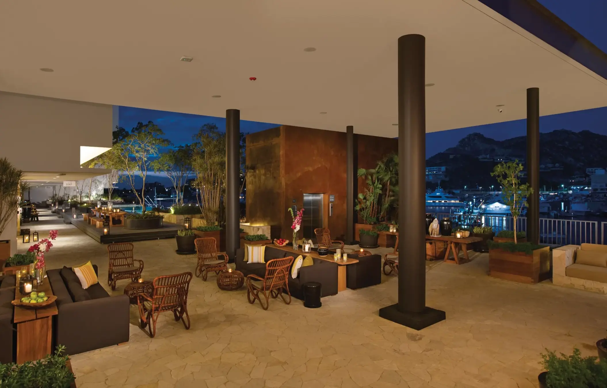 Open-air lobby lounge with modern seating at Breathless Cabo San Lucas