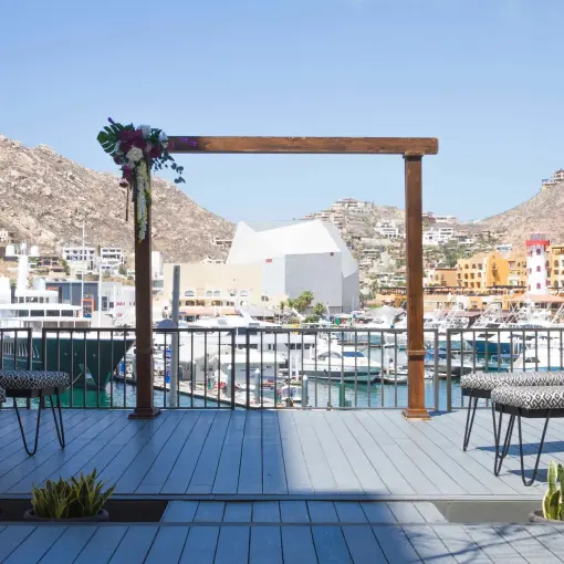Rooftop wedding ceremony arch overlooking the marina at Breathless Cabo San Lucas