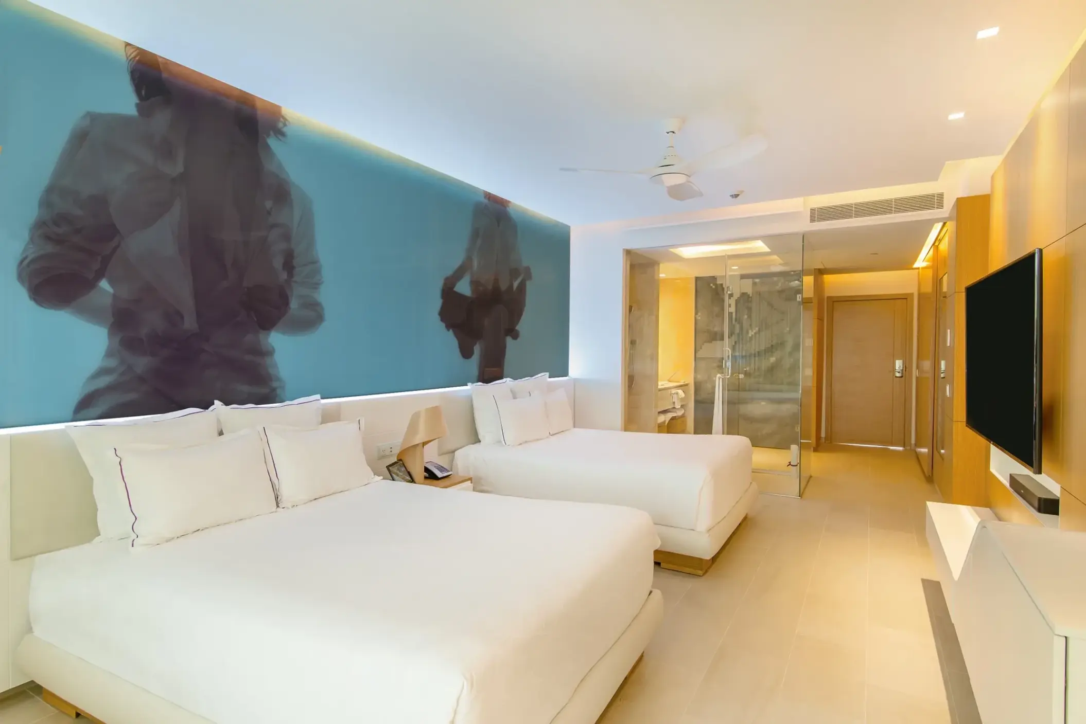 Allure Junior Suite with two double beds and wall mural at Breathless Montego Bay, Montego Bay