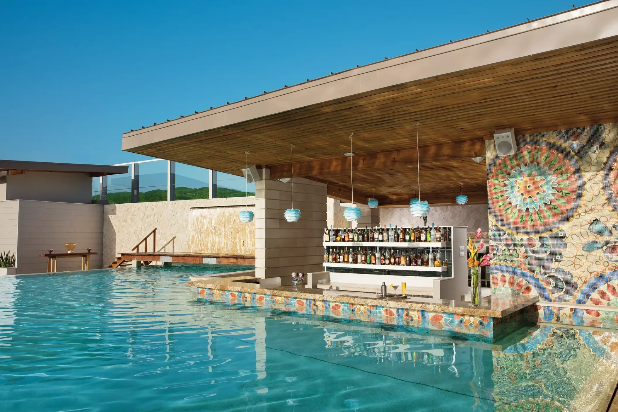 Swim-up bar with colorful mosaic tiling at Breathless Montego Bay, Montego Bay