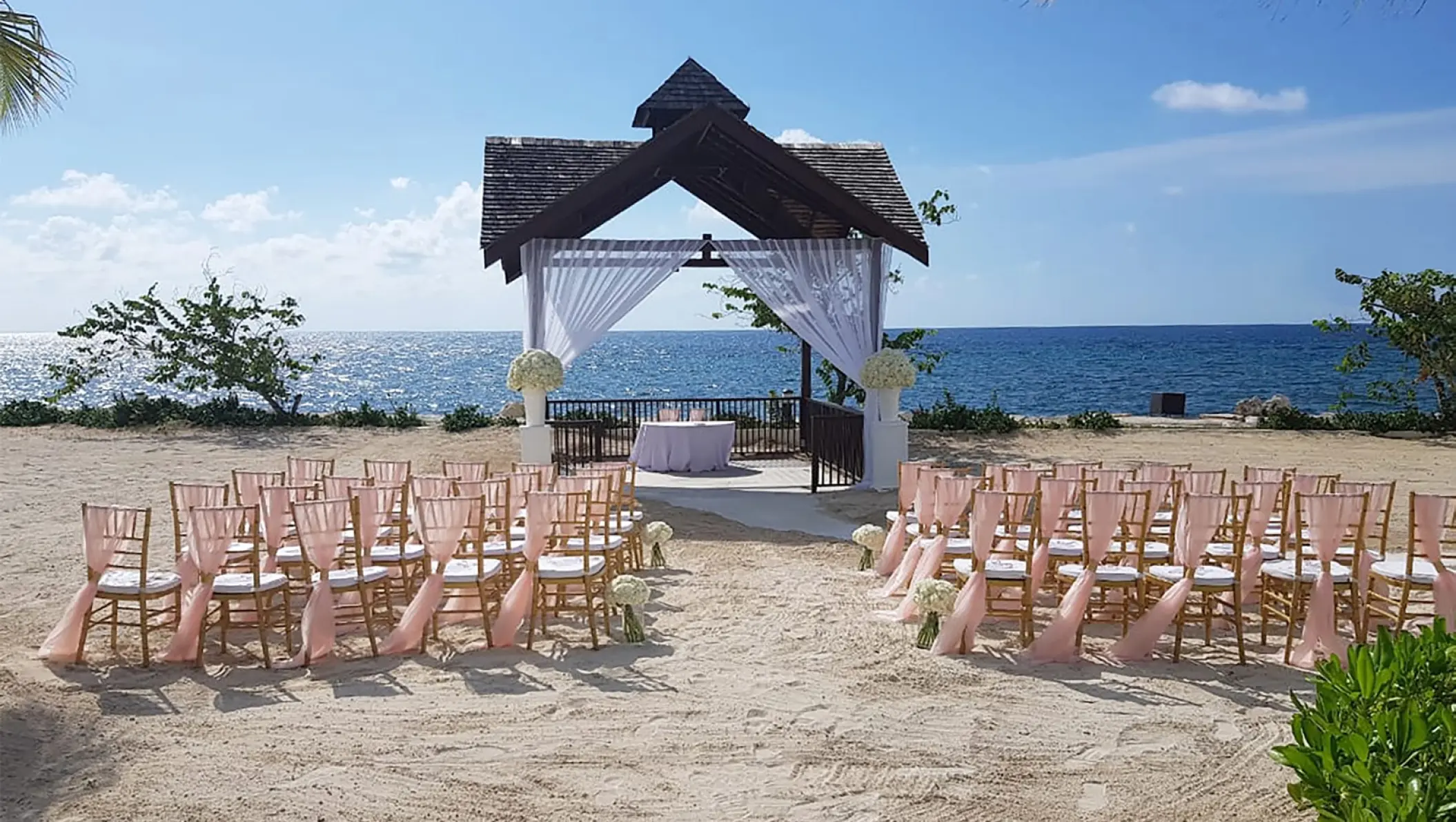 Beachfront wedding ceremony setup at Breathless Montego Bay, Jamaica