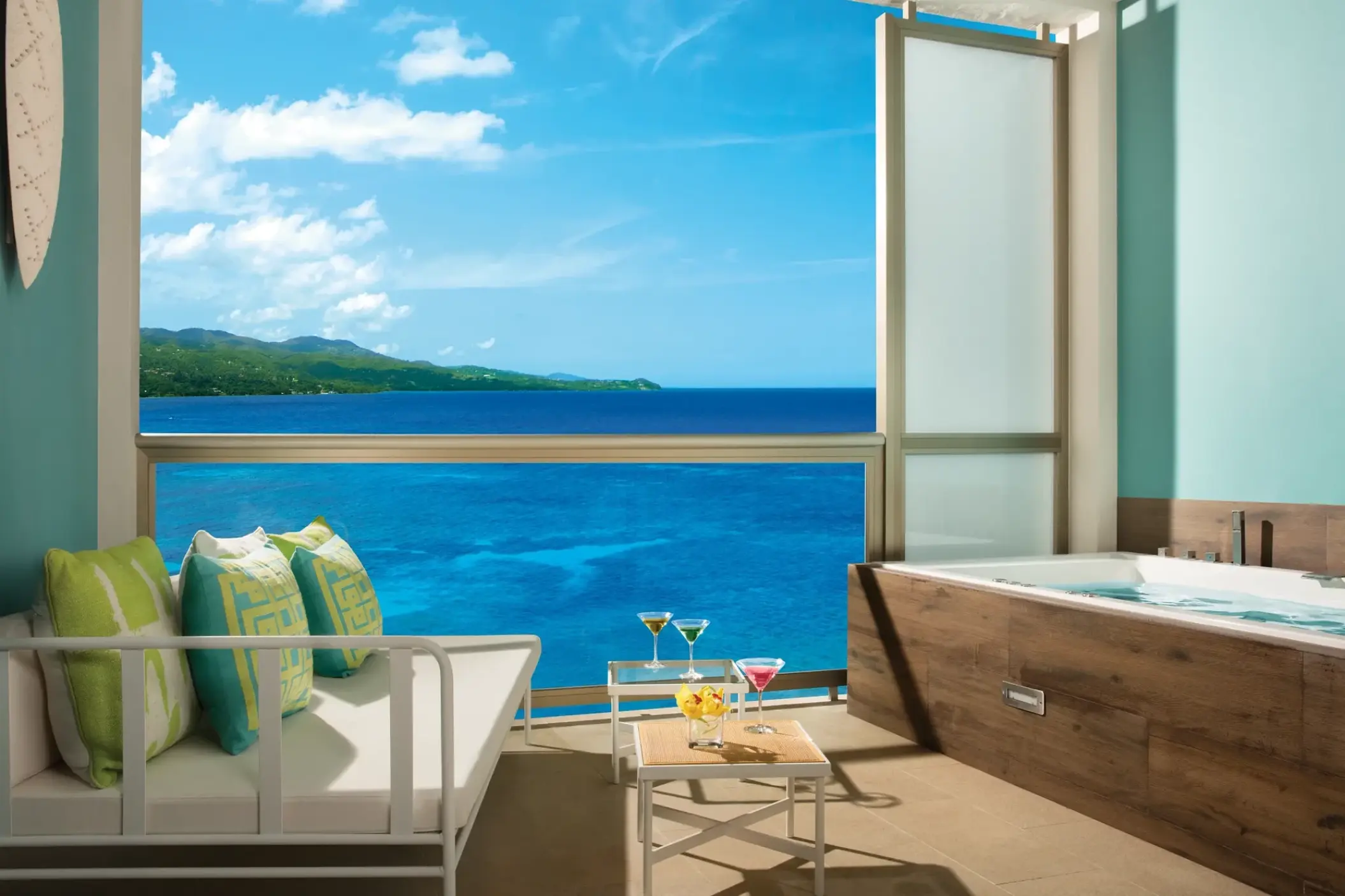 Private terrace with a whirlpool and ocean views at Breathless Montego Bay
