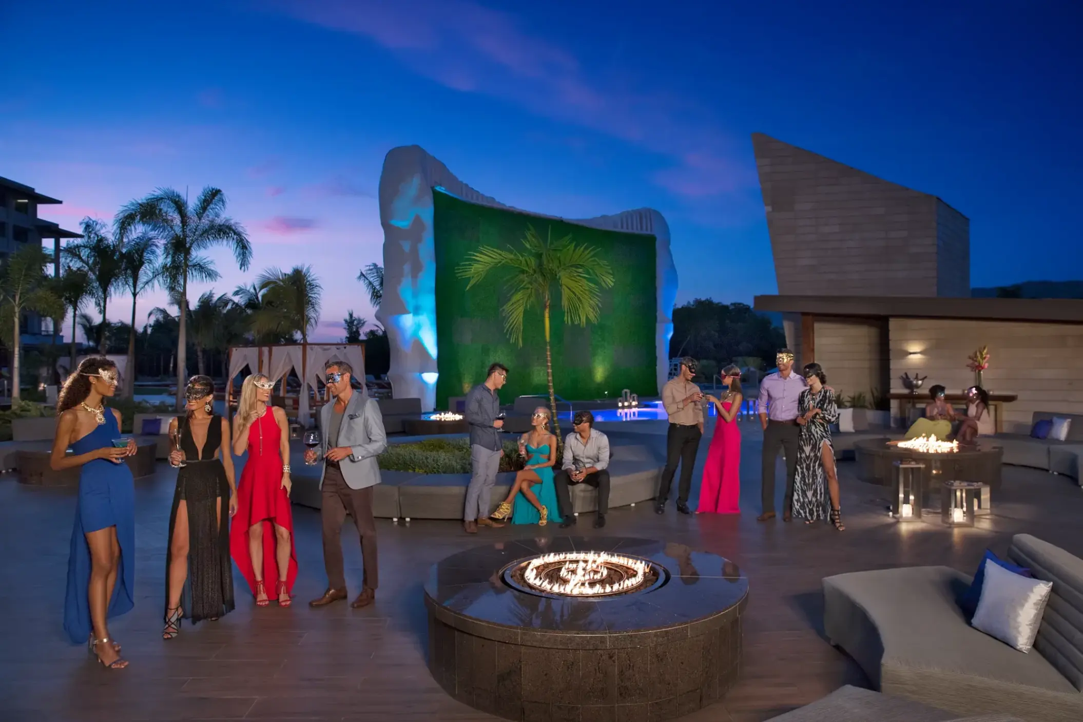 Masquerade party on a rooftop terrace with fire pits at Breathless Montego Bay, Montego Bay