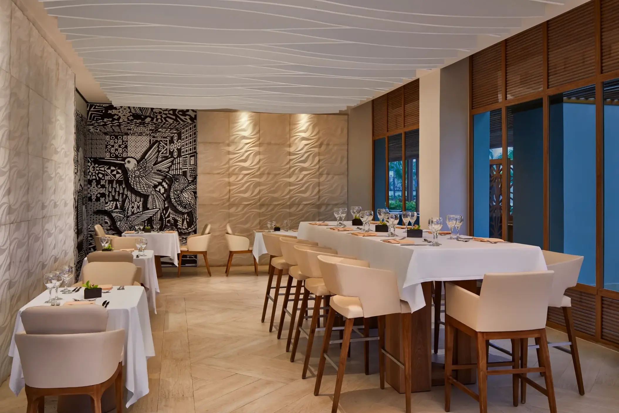 Sofrito restaurant dining room with white table linens at Breathless Montego Bay, Montego Bay
