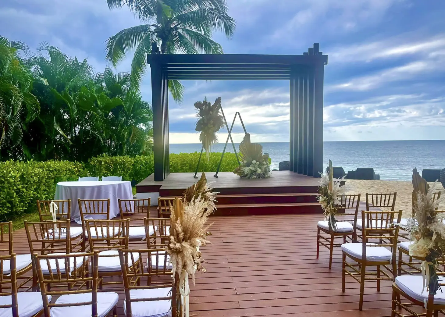 Wooden gazebo wedding ceremony setup overlooking the ocean at Breathless Montego Bay, Jamaica