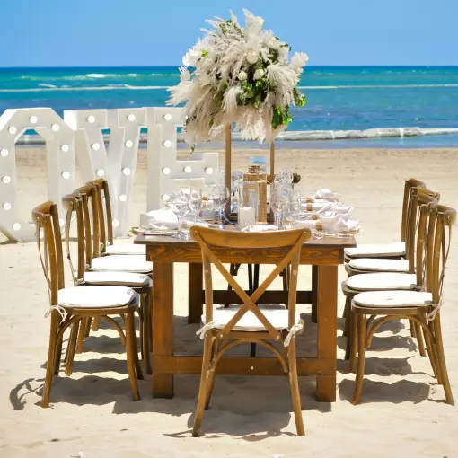 Beachfront wedding reception table with LOVE marquee letters at Breathless Punta Cana, Punta Cana