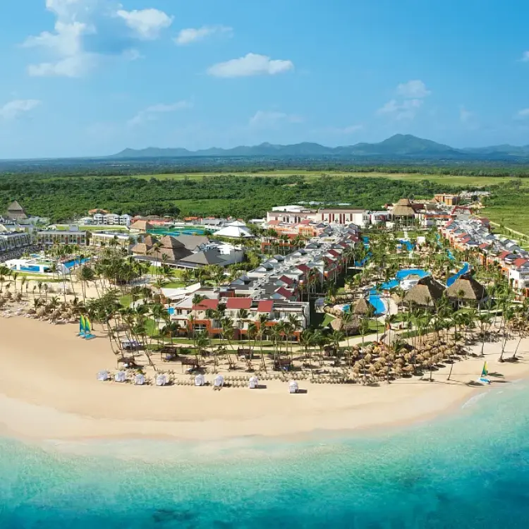 Aerial view of Breathless Punta Cana beachfront buildings and pools along the Caribbean coast, Punta Cana