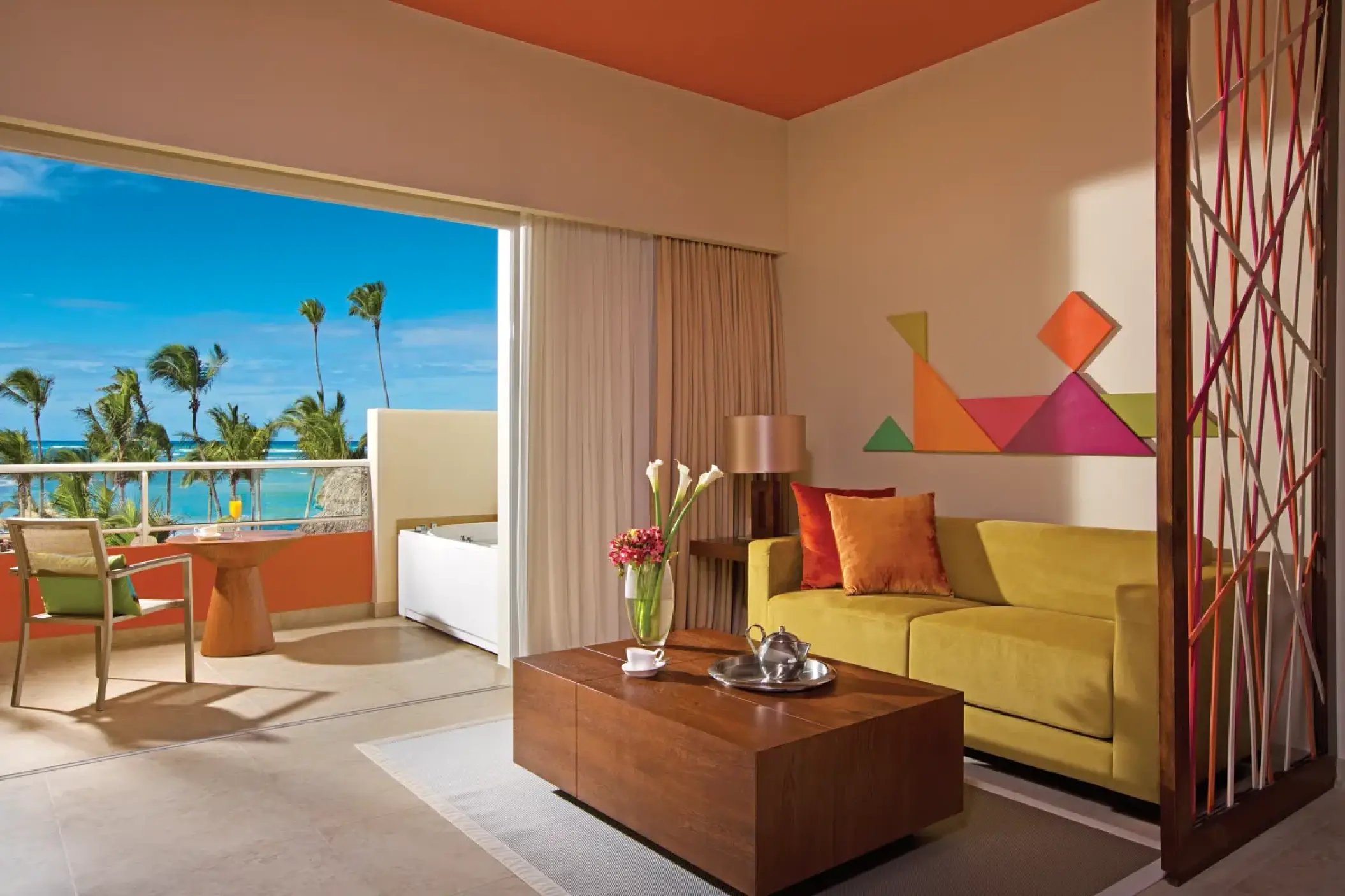 Junior Suite living area and balcony with ocean views at Breathless Punta Cana, Punta Cana