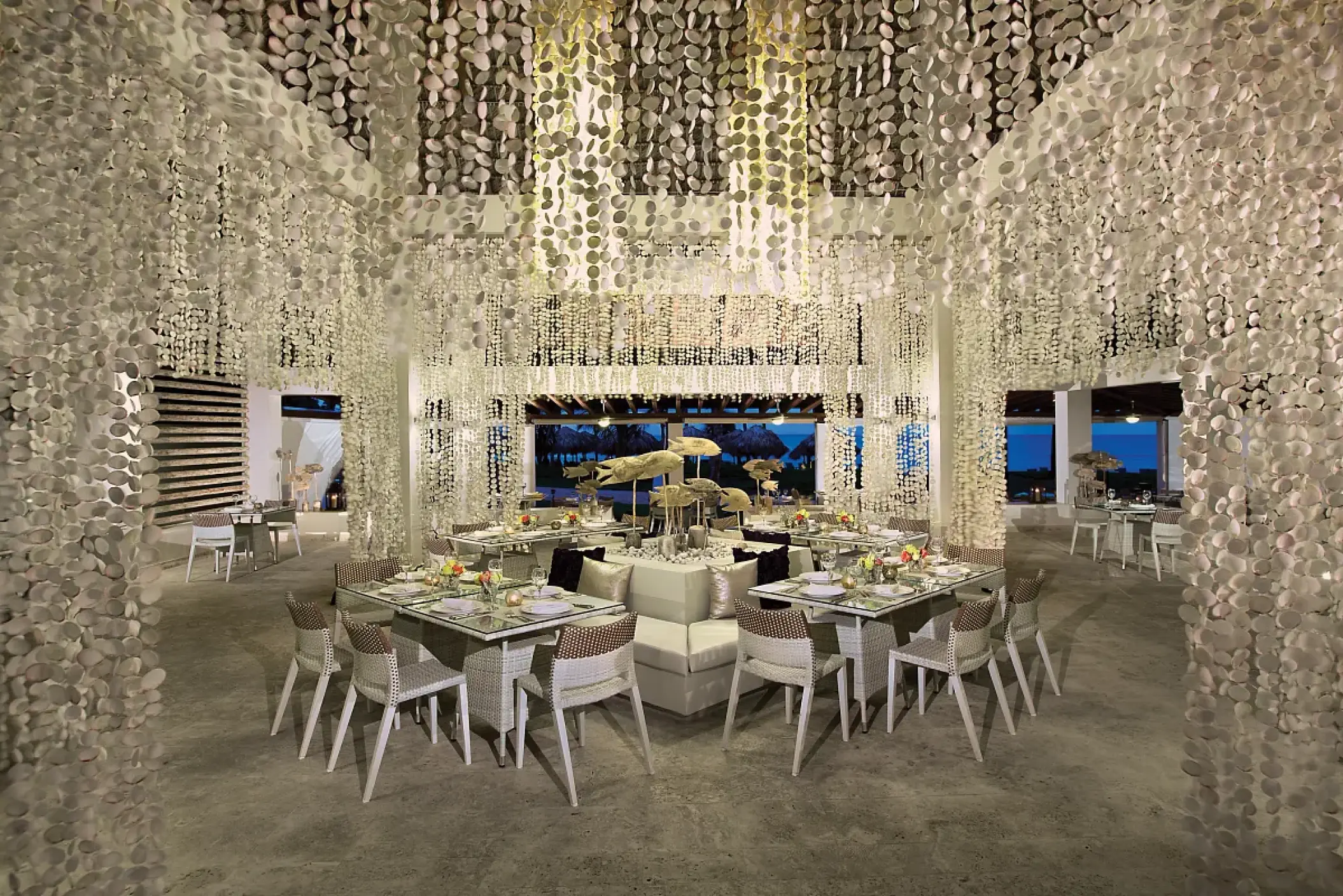 Modern Sofrito restaurant dining room with beaded curtains at Breathless Punta Cana