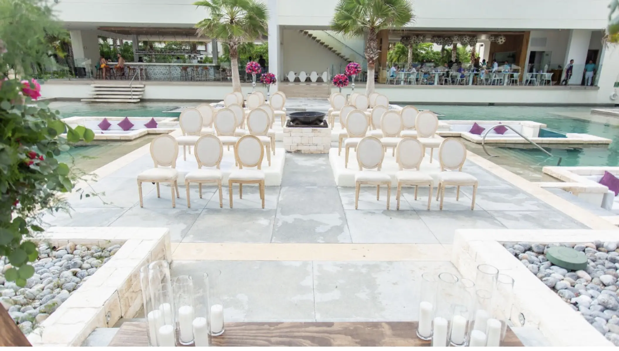 Wedding ceremony setup on a terrace over the water at Secrets Riviera Cancun, Riviera Maya