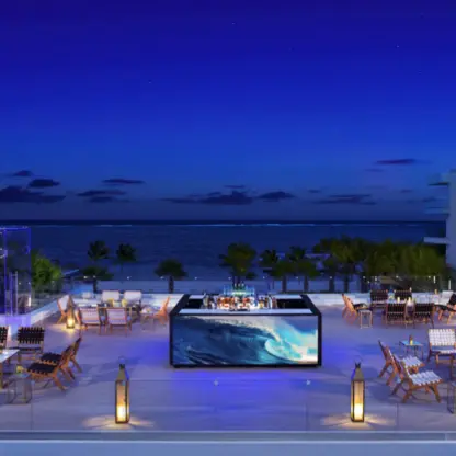 Rooftop lounge with bar and seating at Secrets Riviera Cancun, Riviera Maya