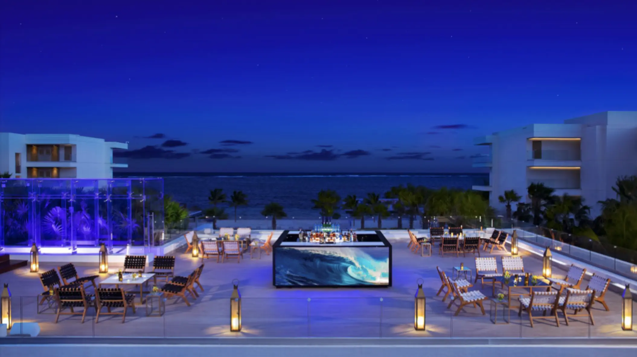 Rooftop lounge with bar and seating at Secrets Riviera Cancun, Riviera Maya
