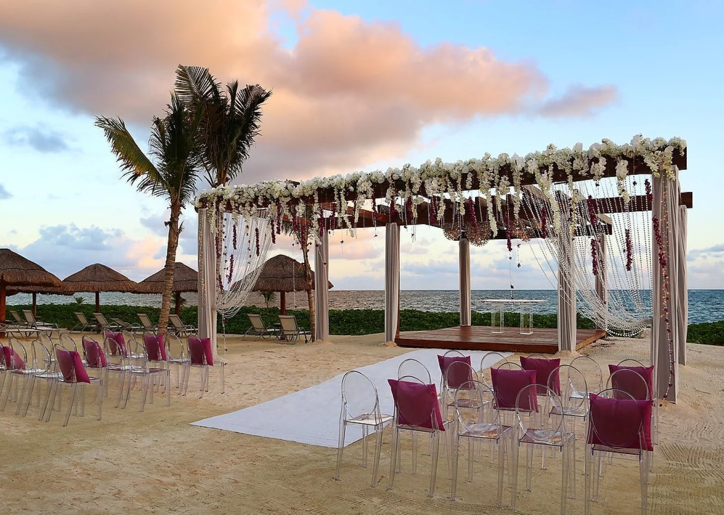 Breathless Riviera Cancun beach wedding with seats and altar