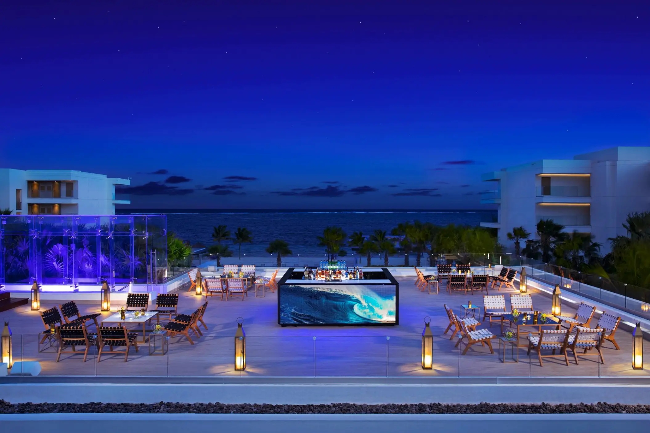 Rooftop reception venue at Breathless Riviera Cancun overlooking the ocean at night, Riviera Maya