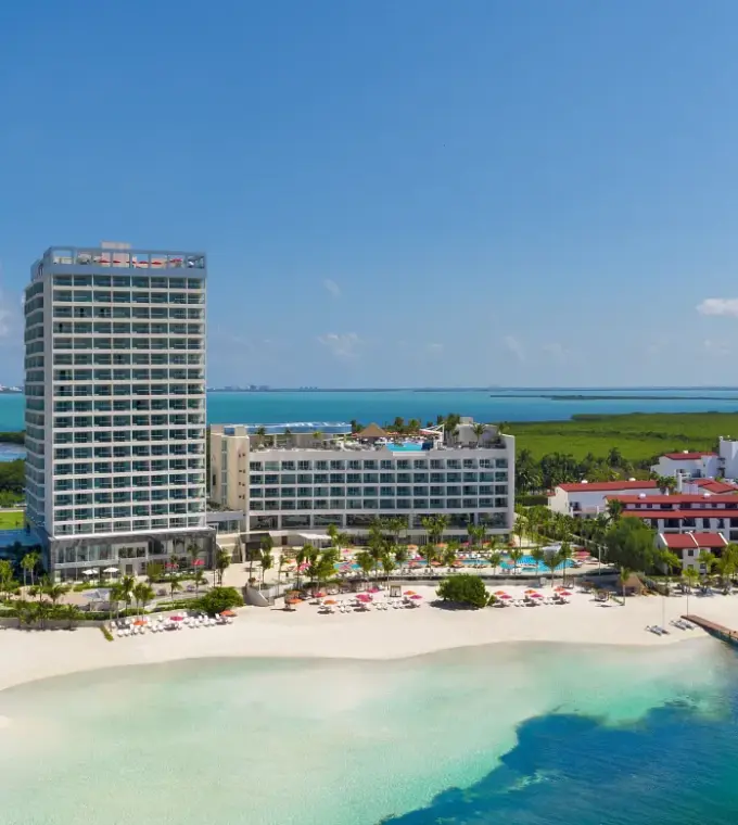 Aerial view of Breathless Cancun Soul beach and modern resort towers, Cancun