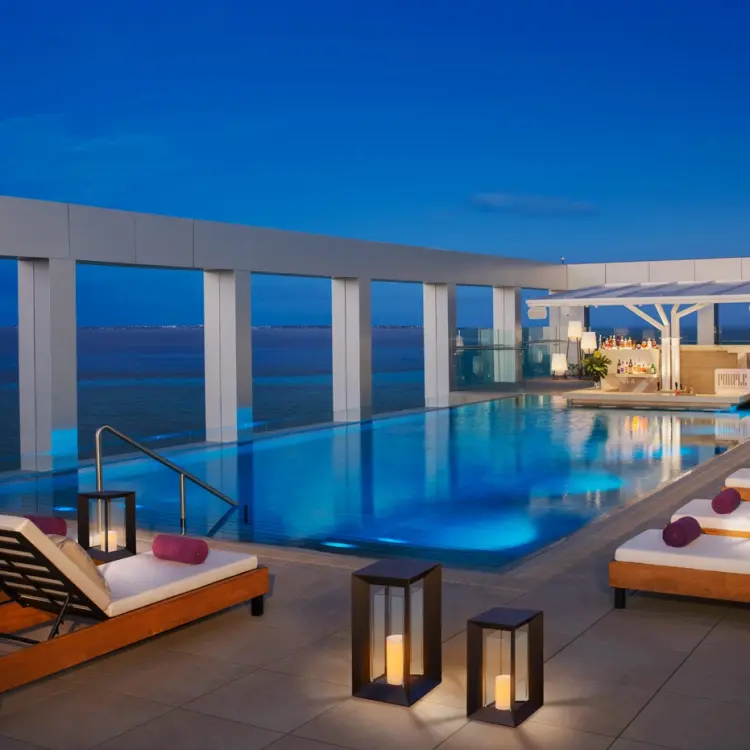 Rooftop infinity pool and lounge terrace at Breathless Cancun Soul, Cancun