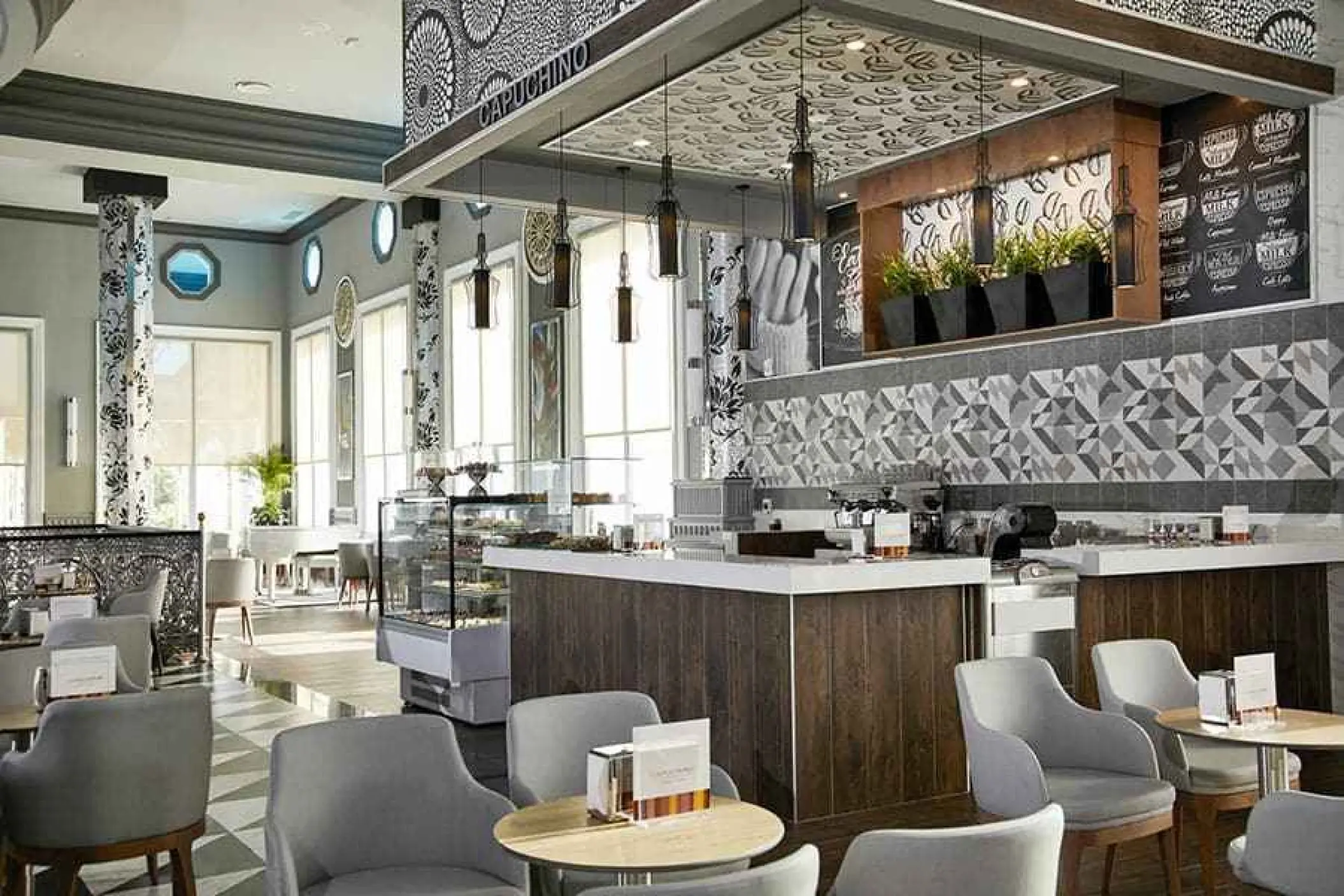 Capuchino coffee shop with modern decor and seating at Riu Palace Riviera Maya, Playa Del Carmen