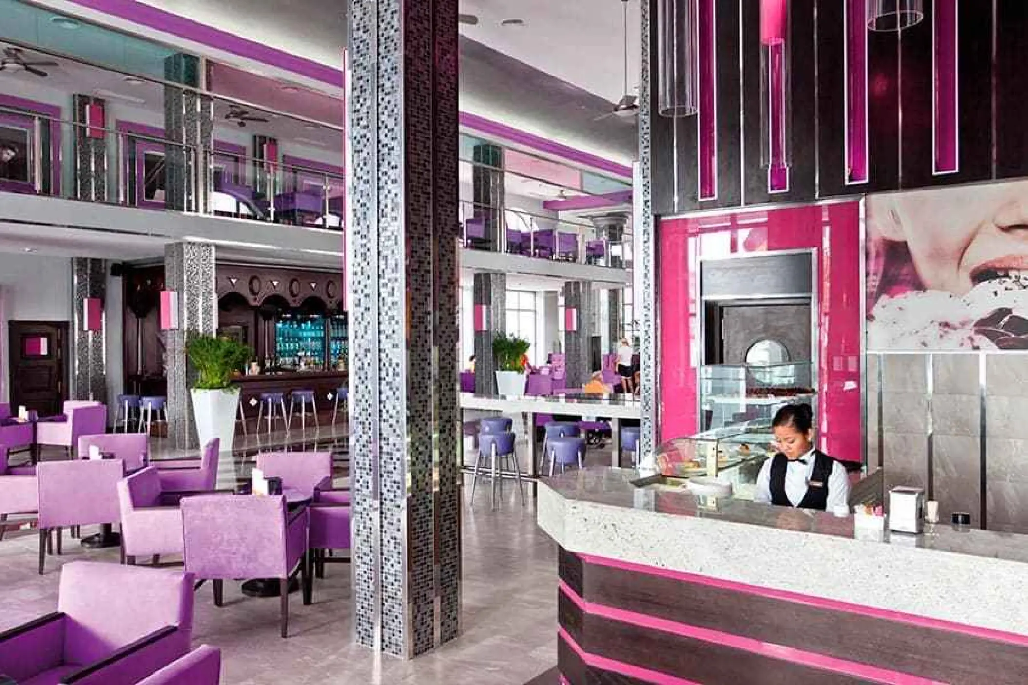 Capuchino Patisserie with pink and purple decor at Riu Palace Mexico, Playa Del Carmen