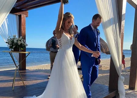 groom and bride just married walking out of the isle