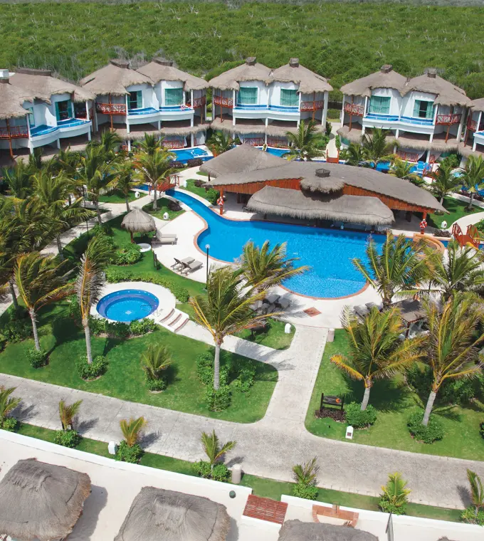 Aerial view of private casitas and tropical lagoon pools at El Dorado Casitas Royale, Riviera Maya