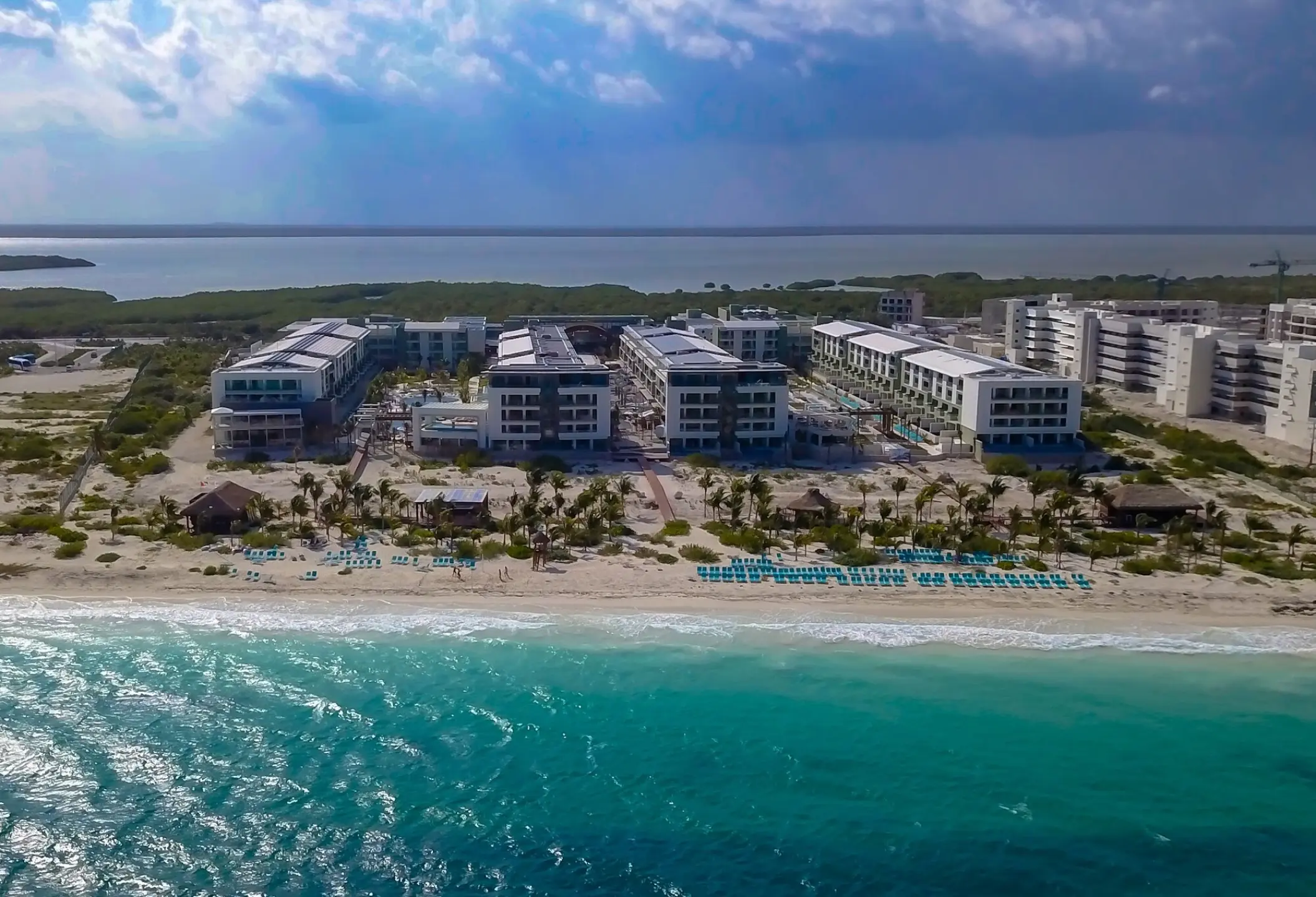 Aerial view of Catalonia Grand Costa Mujeres beachfront and modern suites, Cancun