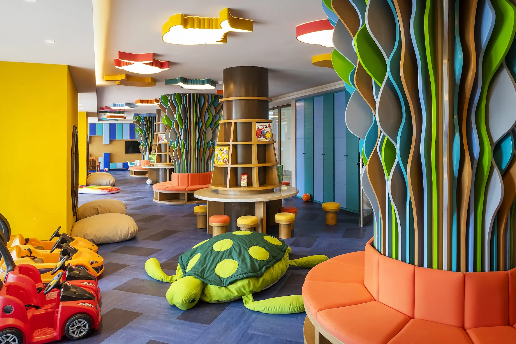 Colorful kids club with turtle pillows and decorative trees at Catalonia Grand Costa Mujeres, Cancun